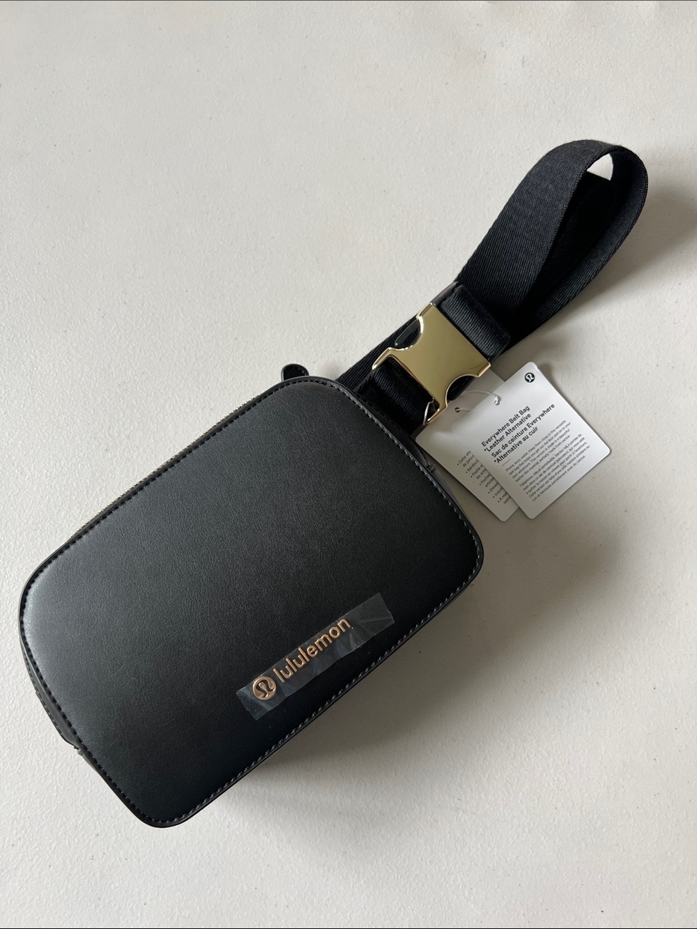 NWT Lululemon Black/Gold leather alt Crossbody Belt Bag